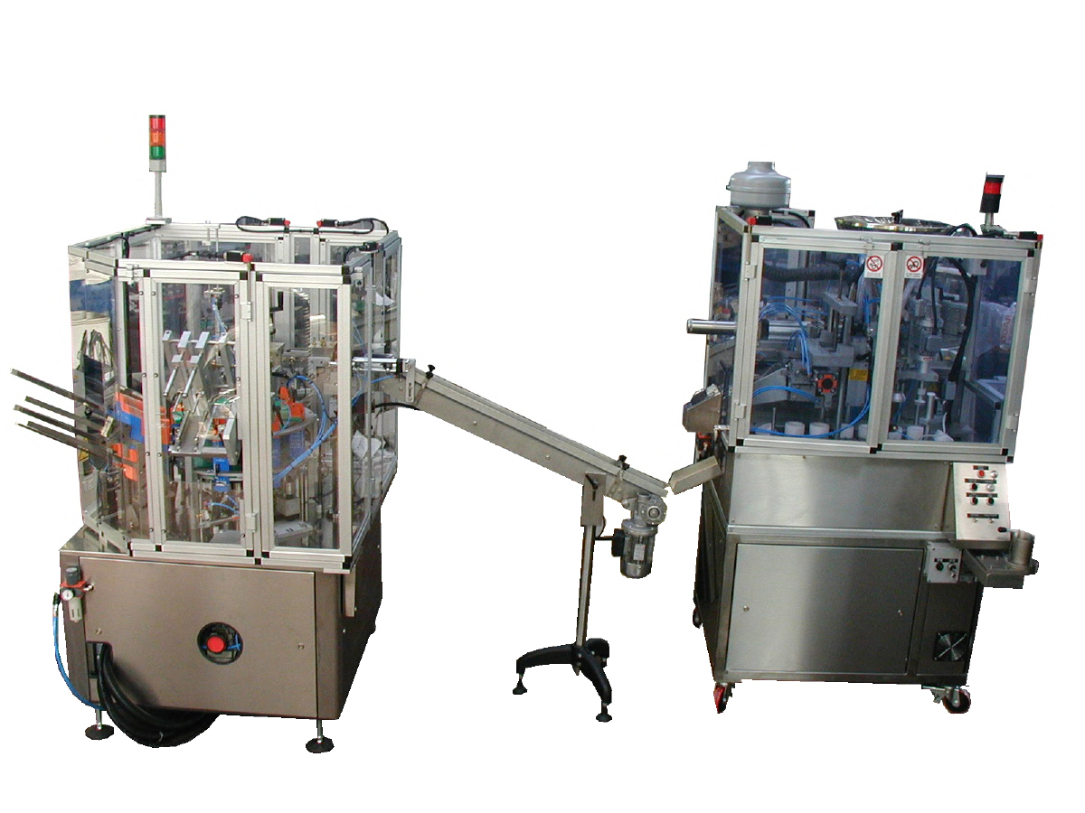 Tube filling and cartoning machines